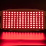 Red light therapy device with multiple LED lights on a dark background
